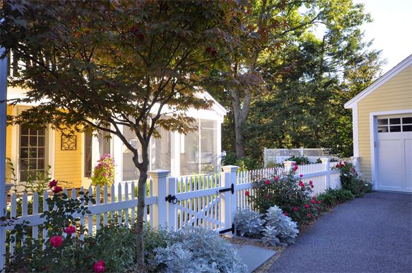 31 MacArthur Road Concord, MA 01742 - Photo 28 of 30 a front view of a house with a garden