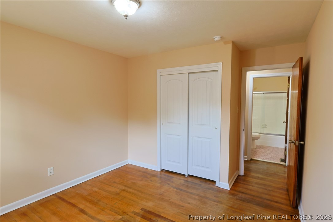 3315 Nato Road Fayetteville, NC 28306 - Photo 15 of 28 a view of an empty room and wooden floor