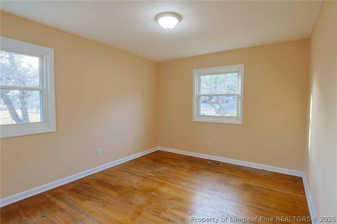 3315 Nato Road Fayetteville, NC 28306 - Photo 17 of 28 a view of empty room with wooden floor