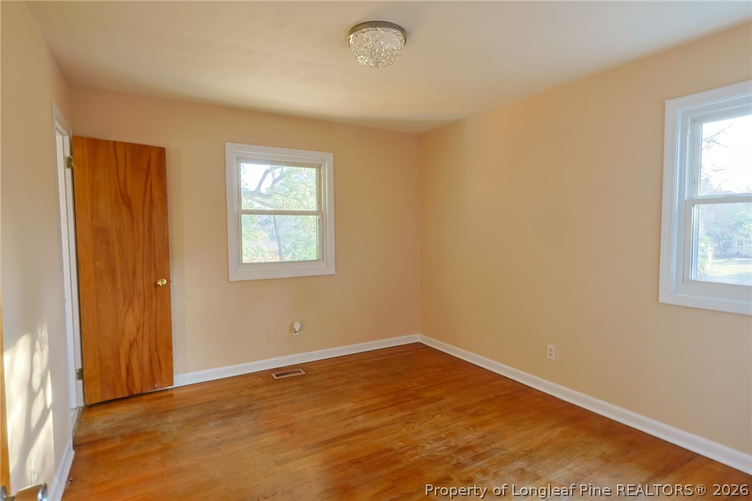 3315 Nato Road Fayetteville, NC 28306 - Photo 19 of 28 an empty room with windows