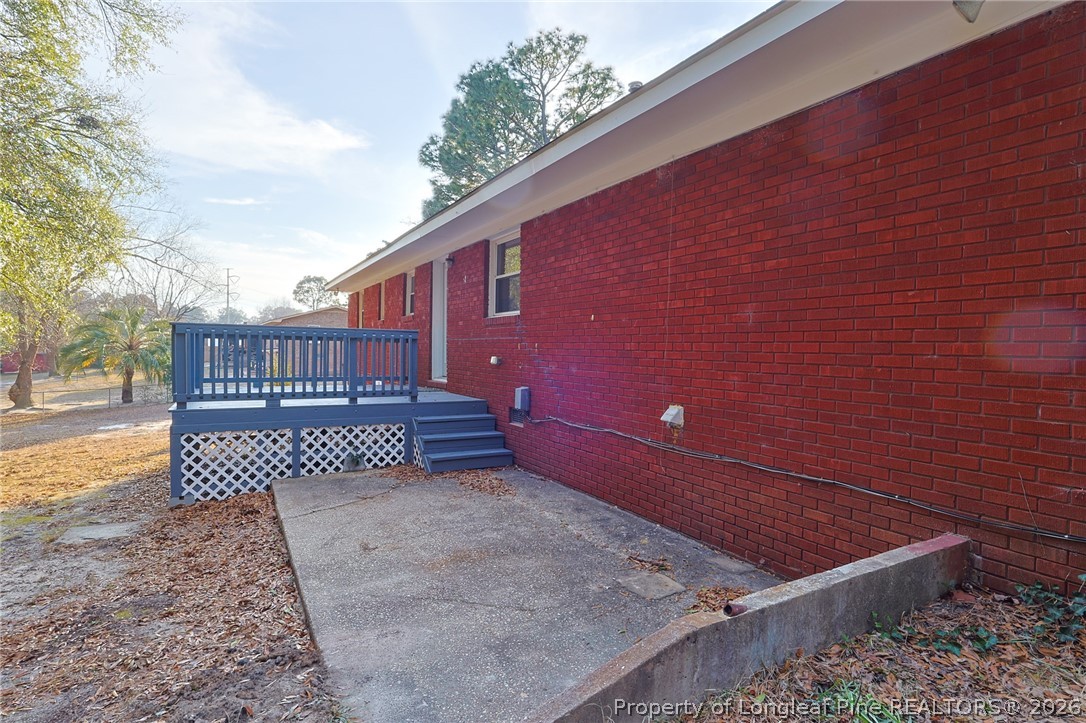3315 Nato Road Fayetteville, NC 28306 - Photo 22 of 28 a view of a backyard with a fence