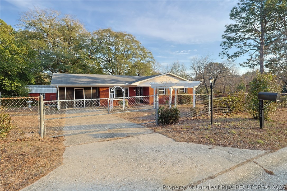 3315 Nato Road Fayetteville, NC 28306 - Photo 3 of 28 a front view of a house with a porch