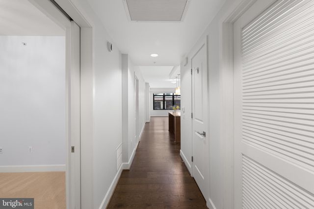 a living room with fireplace furniture and a flat screen tv