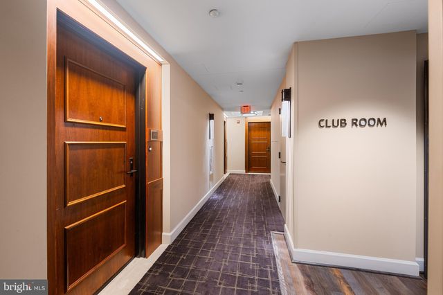 a kitchen with stainless steel appliances a stove a sink and a refrigerator