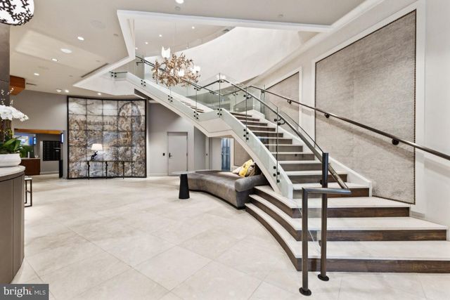 a bed room with a bed and furniture