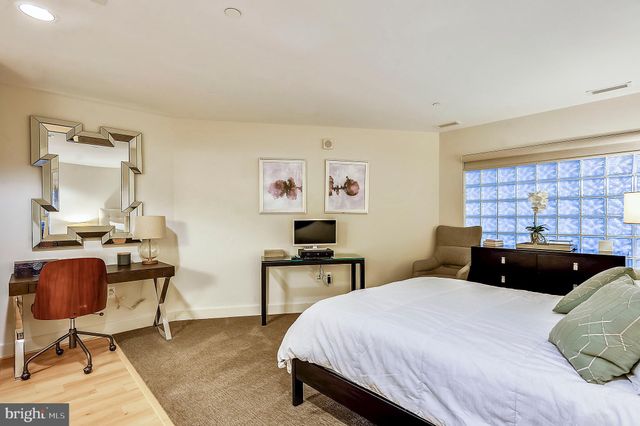 a view of a street with an outdoor space