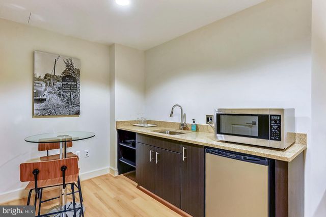 a view of a building and a street light