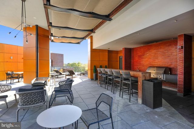 a view of a swimming pool with a lounge chairs