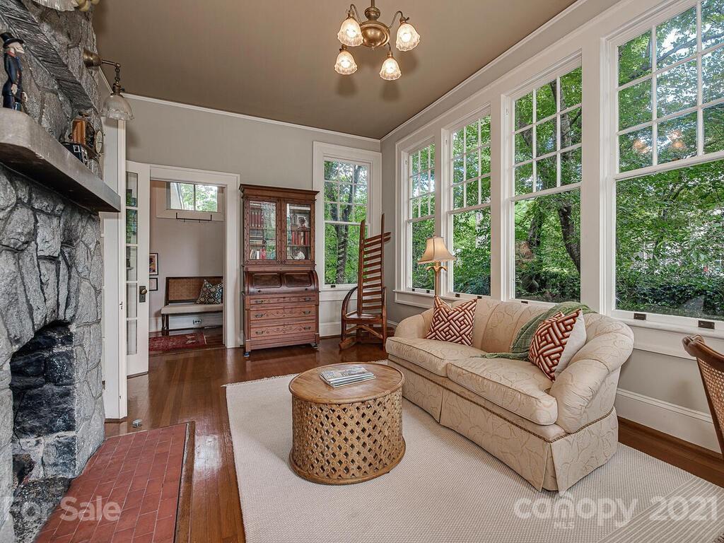 1700 Queens Road Charlotte, NC 28207 - Photo 11 of 48 a living room with furniture and a large window