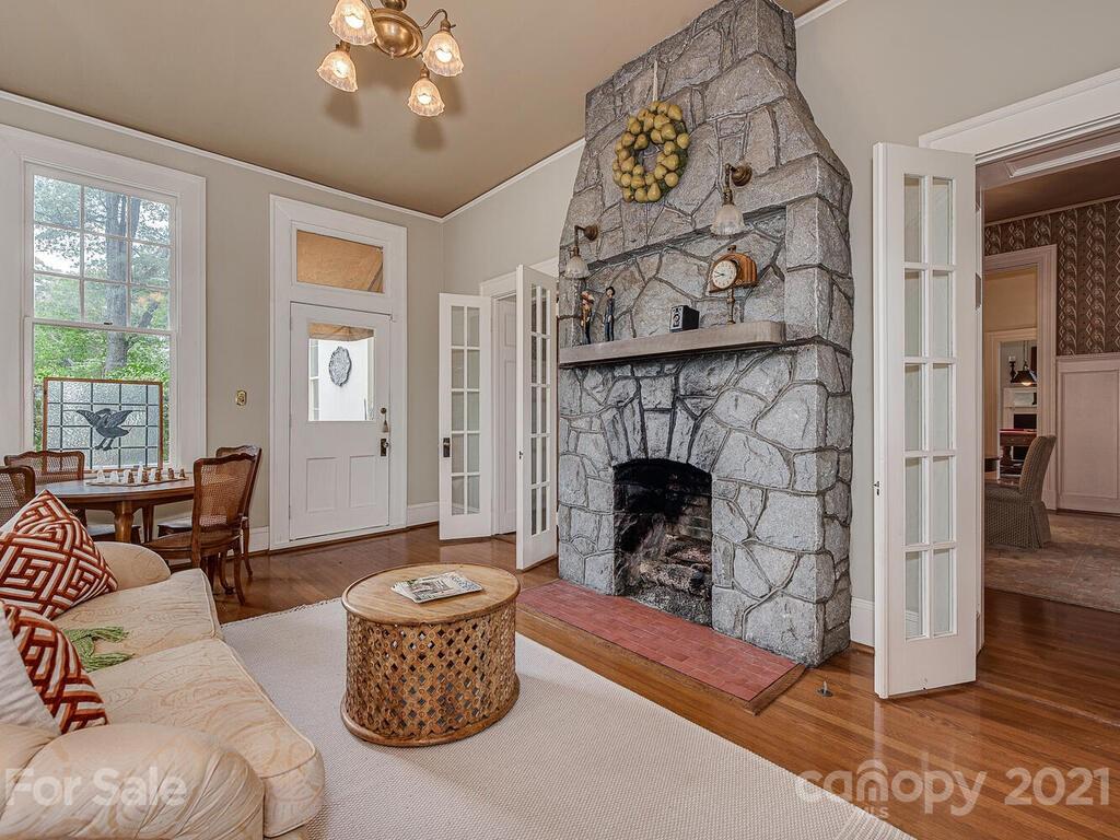 1700 Queens Road Charlotte, NC 28207 - Photo 13 of 48 a living room with furniture and a fireplace