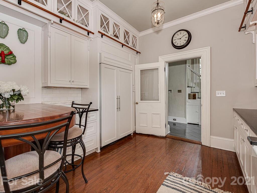1700 Queens Road Charlotte, NC 28207 - Photo 16 of 48 a view of a livingroom with furniture and wooden floor