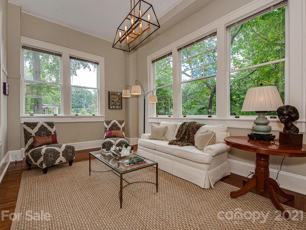 1700 Queens Road Charlotte, NC 28207 - Photo 22 of 48 a living room with furniture and a large window