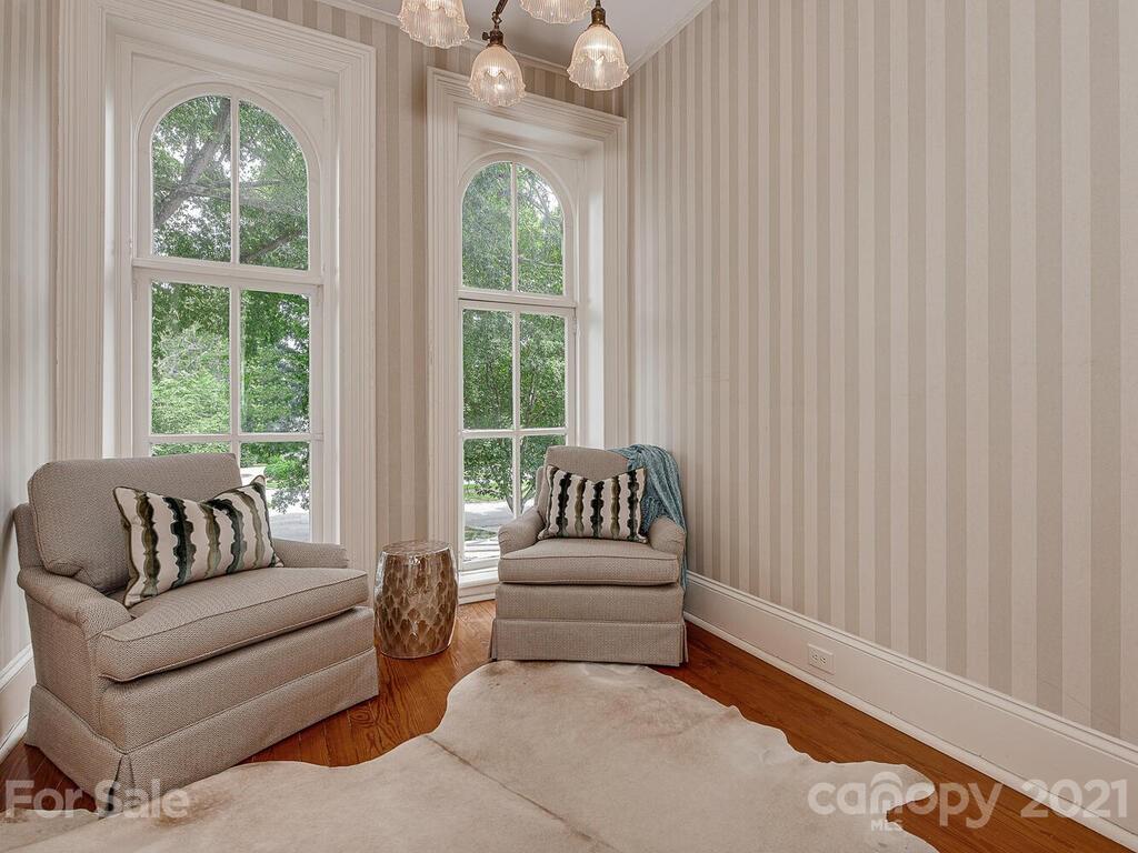 1700 Queens Road Charlotte, NC 28207 - Photo 35 of 48 a living room with furniture and a window