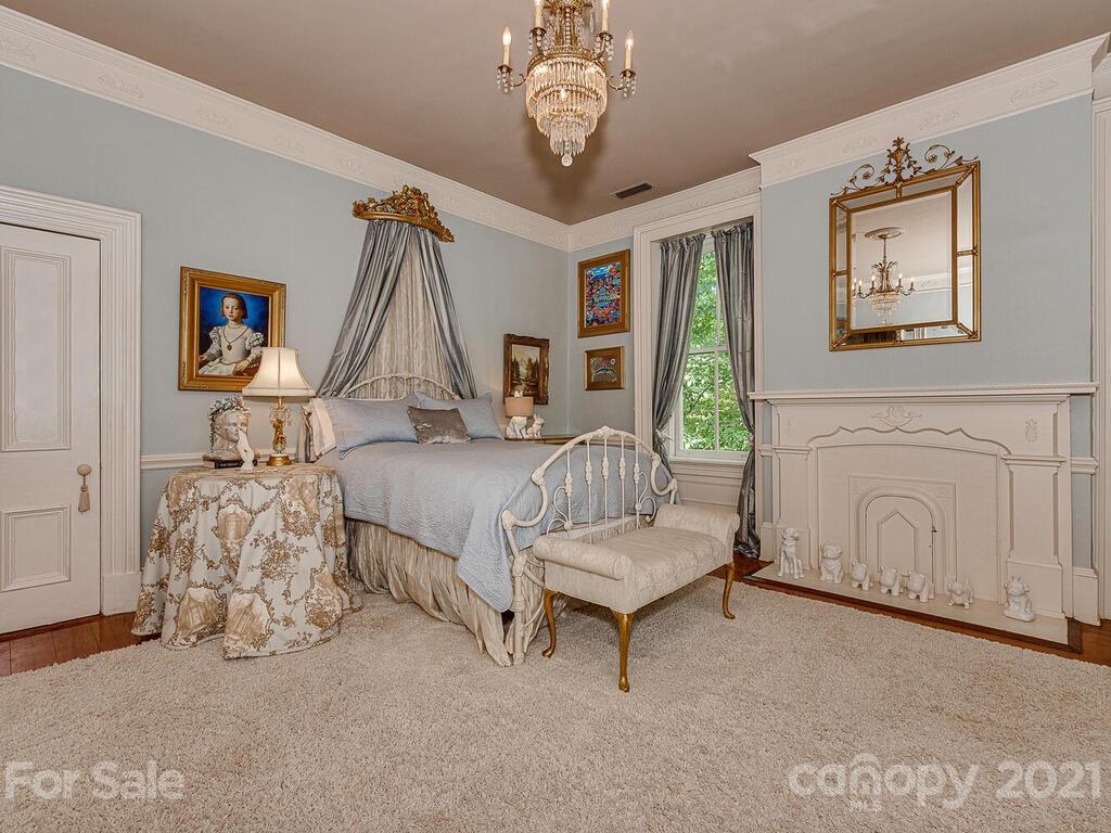 1700 Queens Road Charlotte, NC 28207 - Photo 38 of 48 a bedroom with furniture and a window