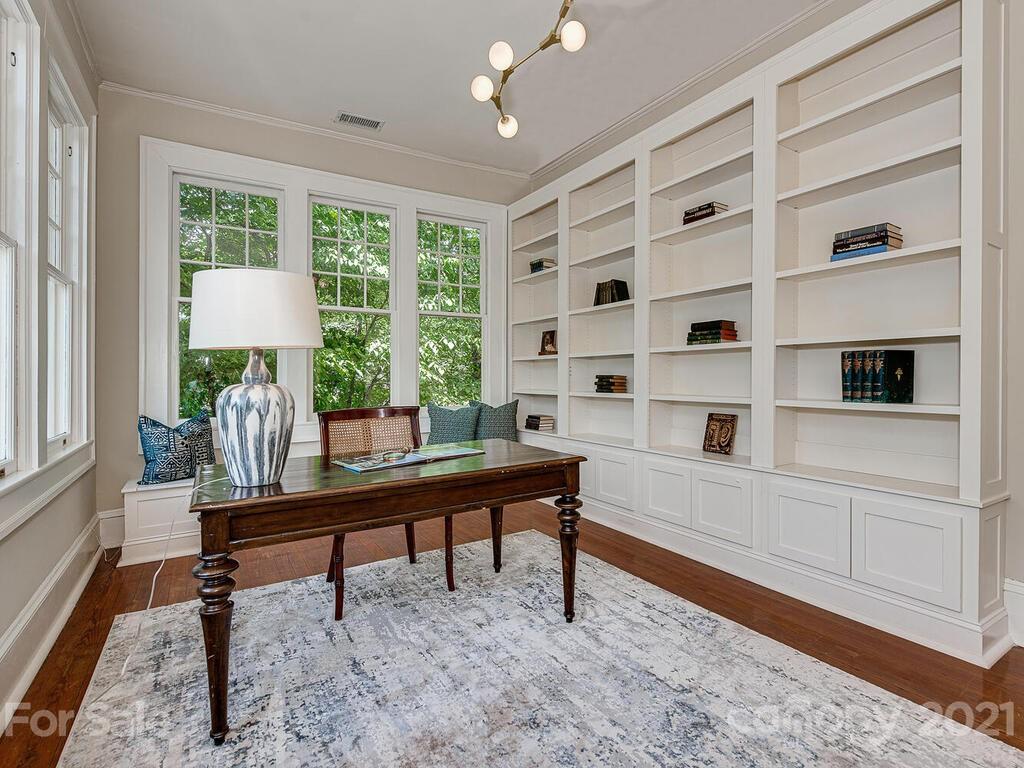 1700 Queens Road Charlotte, NC 28207 - Photo 40 of 48 a view of a workspace with furniture and a window