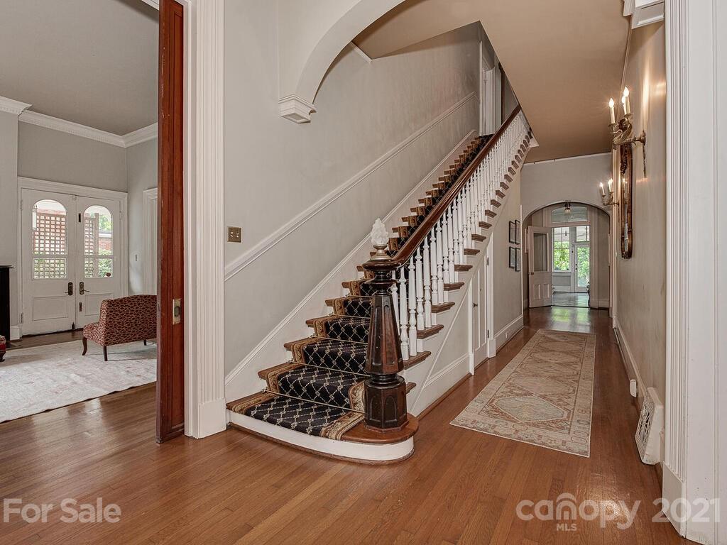 1700 Queens Road Charlotte, NC 28207 - Photo 5 of 48 a view of entryway and hall with wooden floor