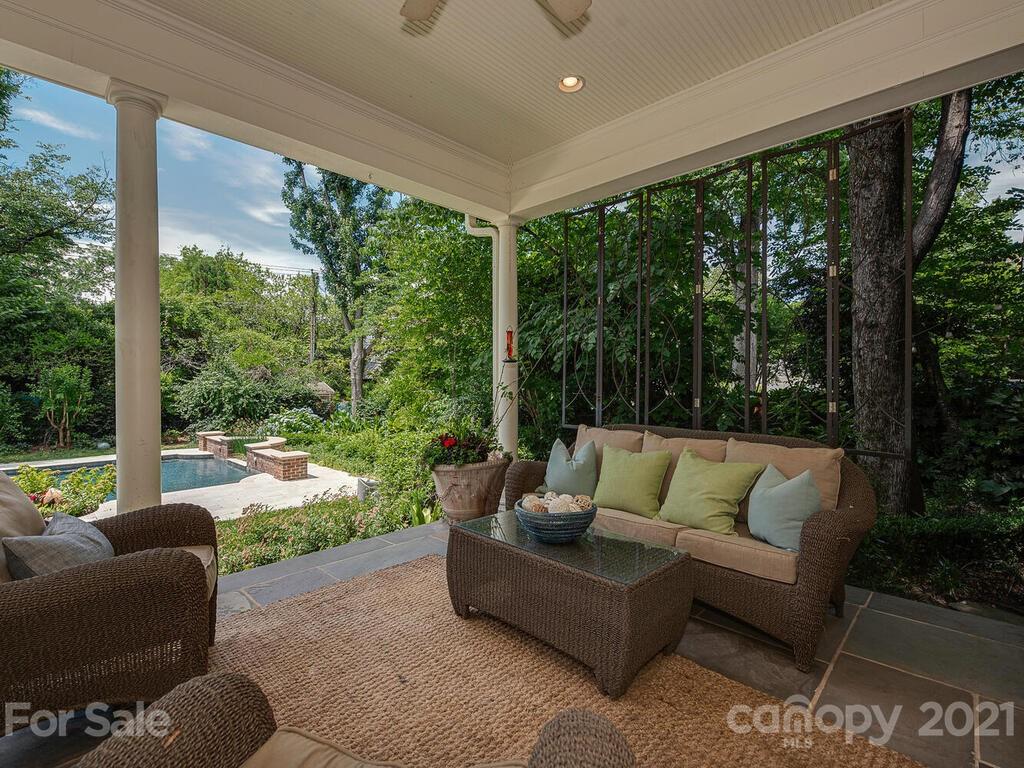 1700 Queens Road Charlotte, NC 28207 - Photo 42 of 48 a outdoor living space with furniture and garden view