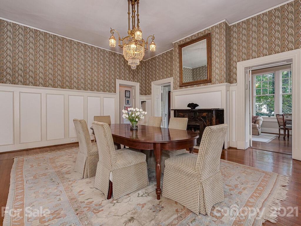 1700 Queens Road Charlotte, NC 28207 - Photo 10 of 48 a view of a dining room with furniture