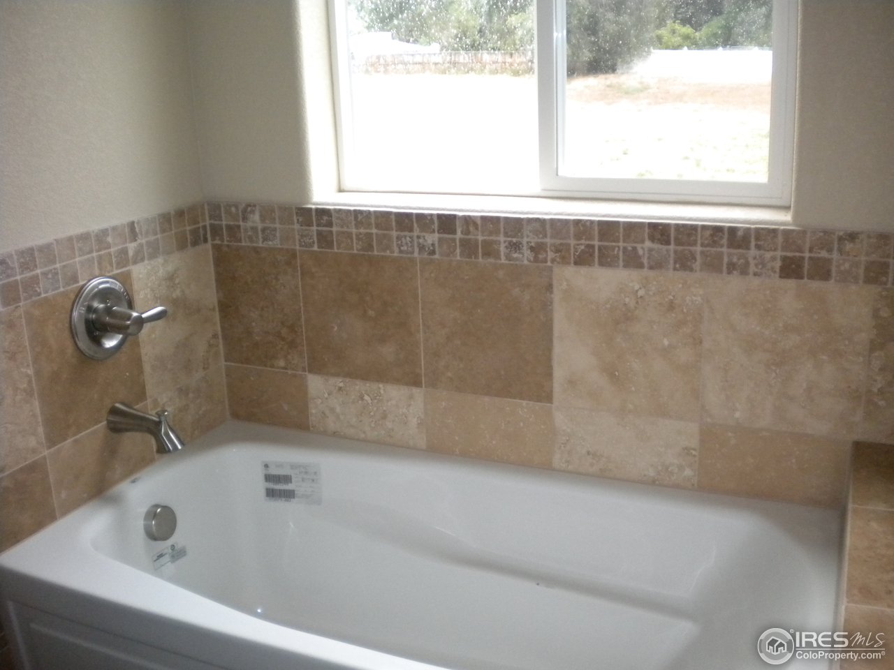1908 Corvid Way Fort Collins, CO 80521 - Photo 14 of 25 5 piece master bath, with beautiful tile