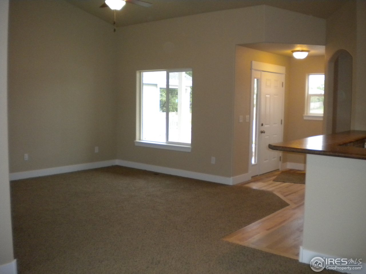 1908 Corvid Way Fort Collins, CO 80521 - Photo 2 of 25 open and vaulted great room