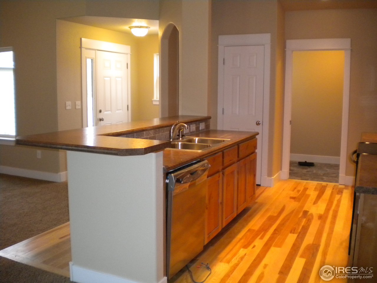 1908 Corvid Way Fort Collins, CO 80521 - Photo 4 of 25 open kitchen with huge pantry