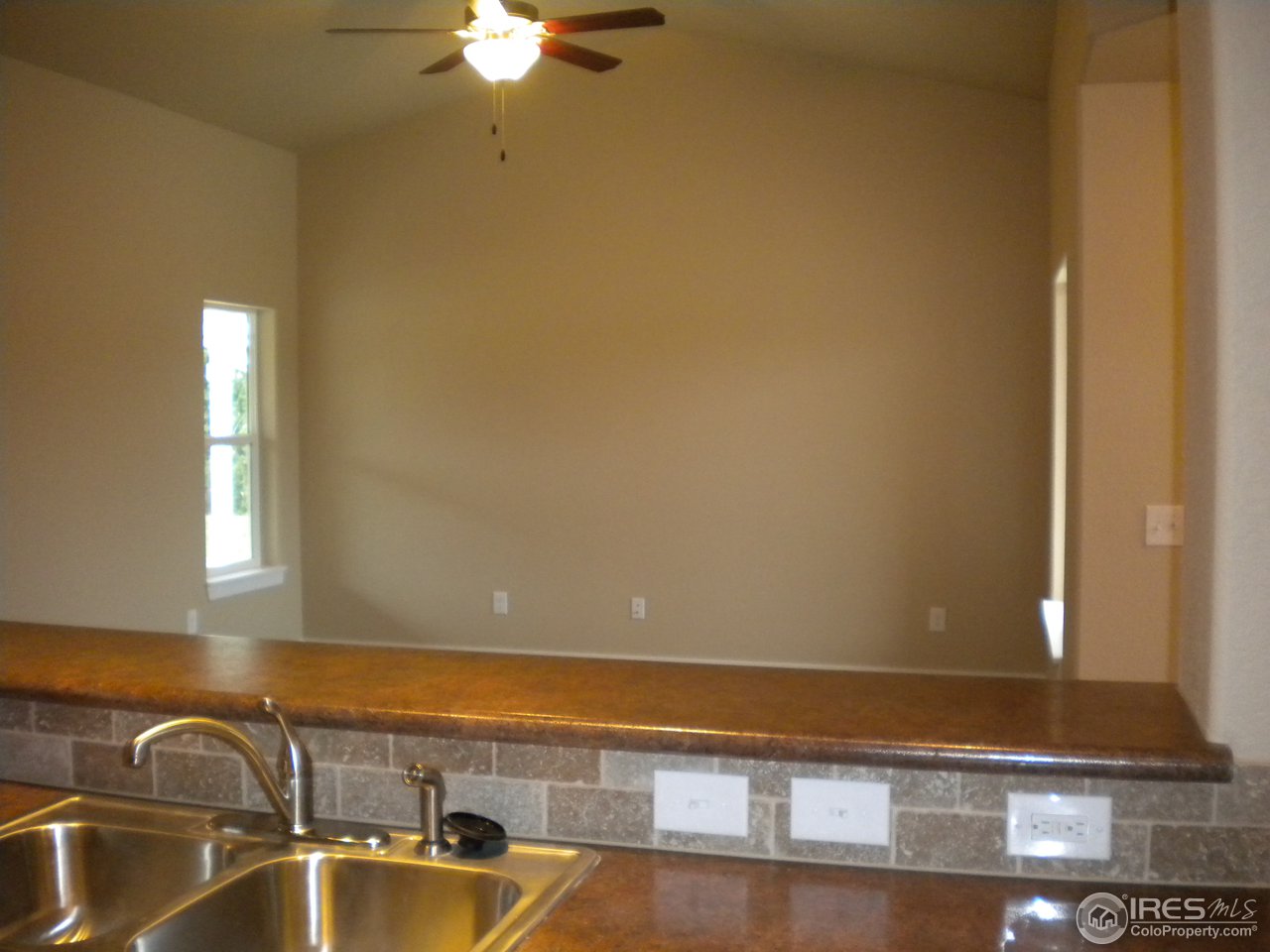 1908 Corvid Way Fort Collins, CO 80521 - Photo 8 of 25 kitchen open to living and dining