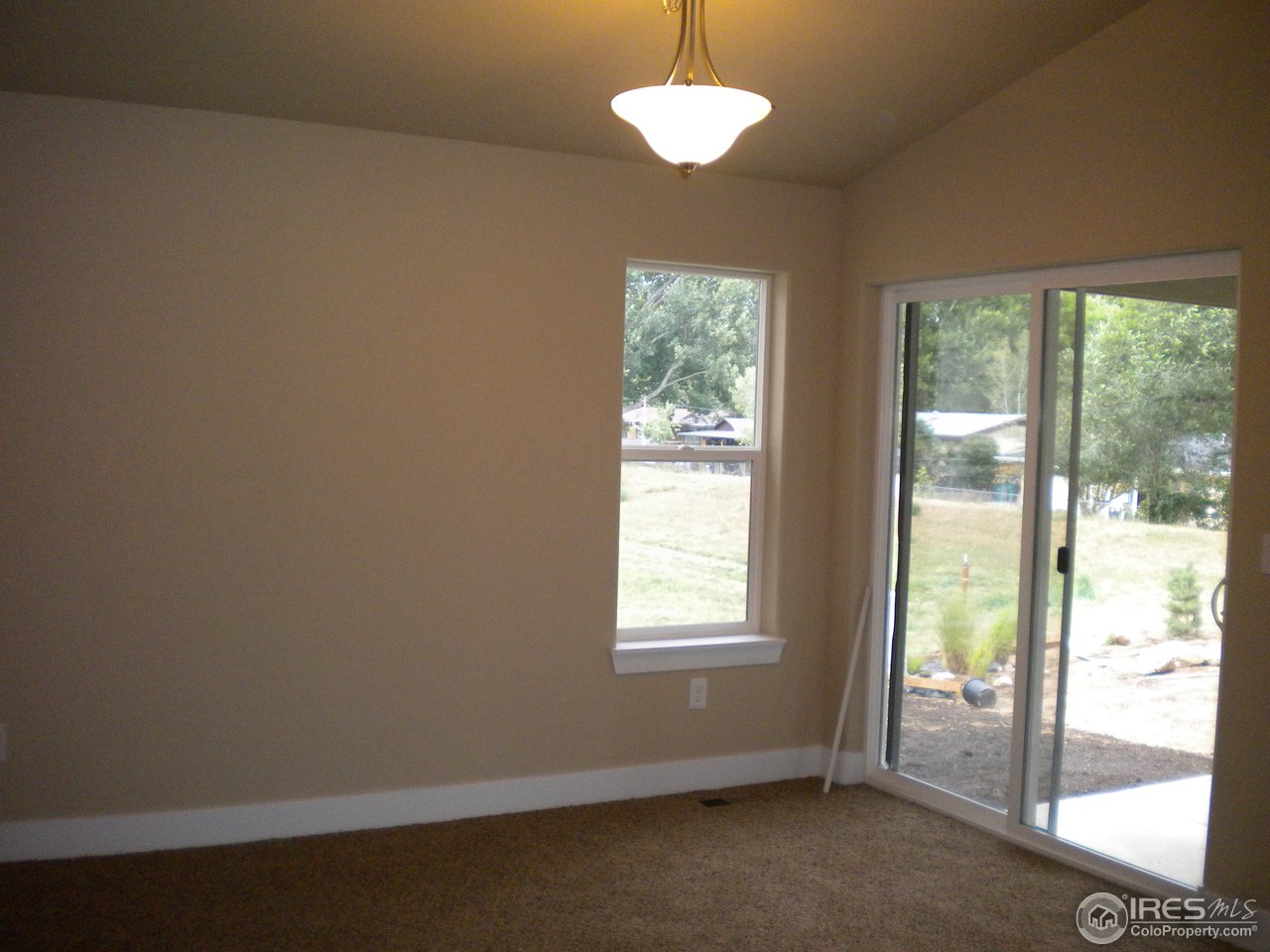 1908 Corvid Way Fort Collins, CO 80521 - Photo 10 of 25 diningroom opens to patio