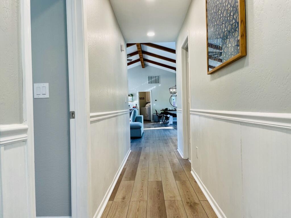 45233 Mineral King Road Three Rivers, CA 93271 - Photo 26 of 39 a view of a hallway with wooden floor and staircase