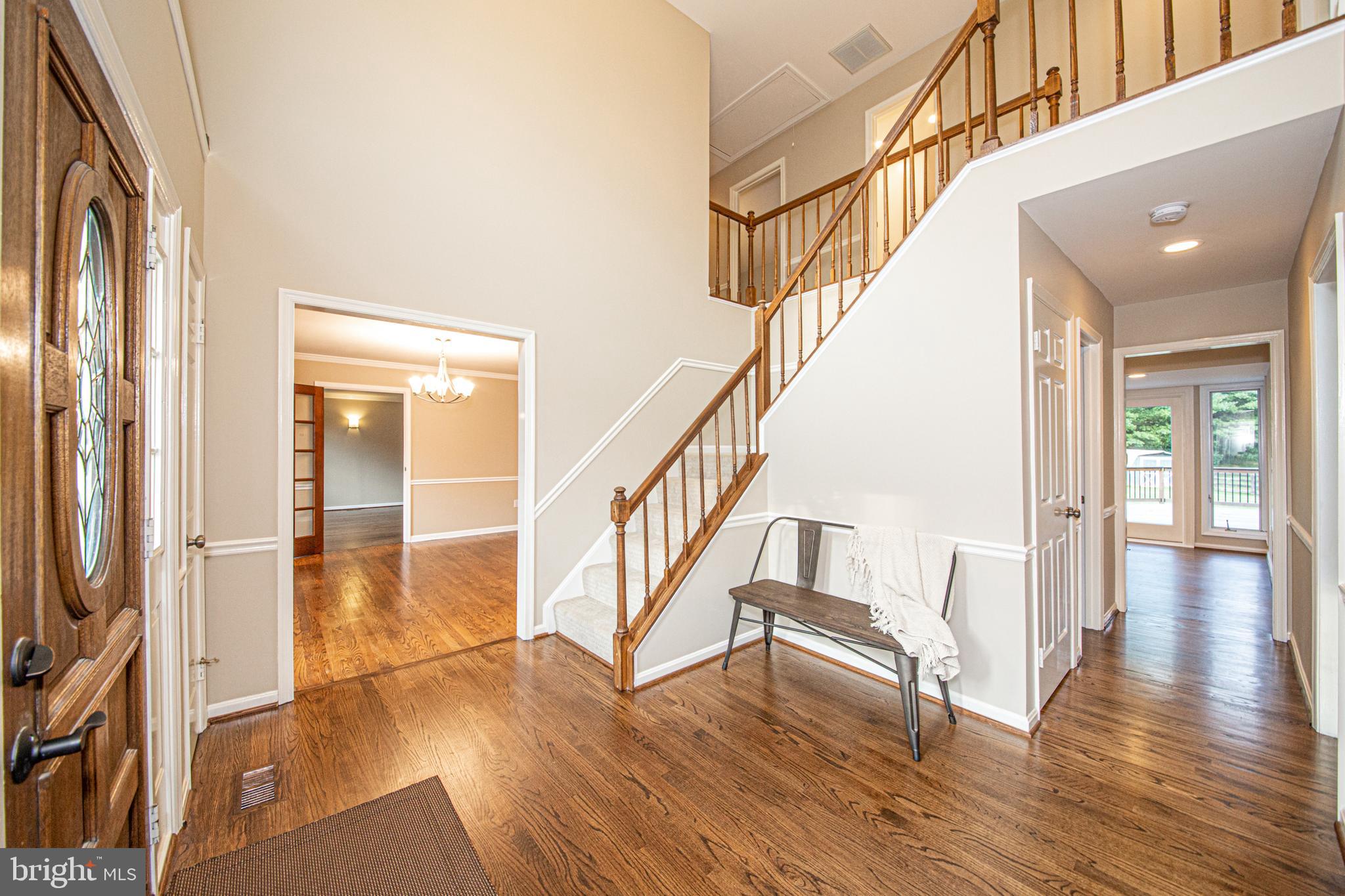 16825 Excaliber Way Sandy Spring, MD 20860 - Photo 3 of 37 Open foyer with coat closets to the left and right