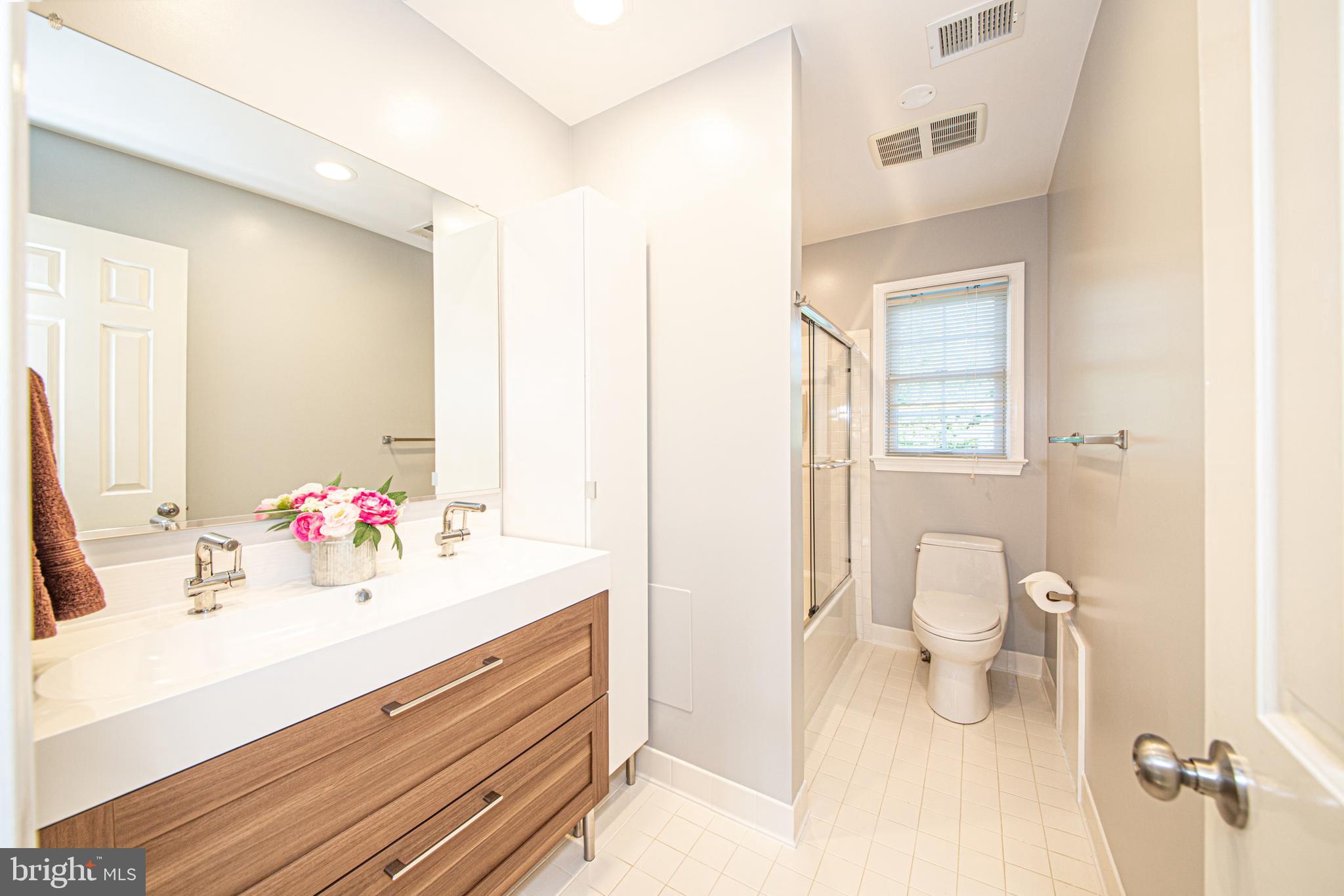 16825 Excaliber Way Sandy Spring, MD 20860 - Photo 22 of 37 Upstairs Hallway full bath, dual slow-close vanity