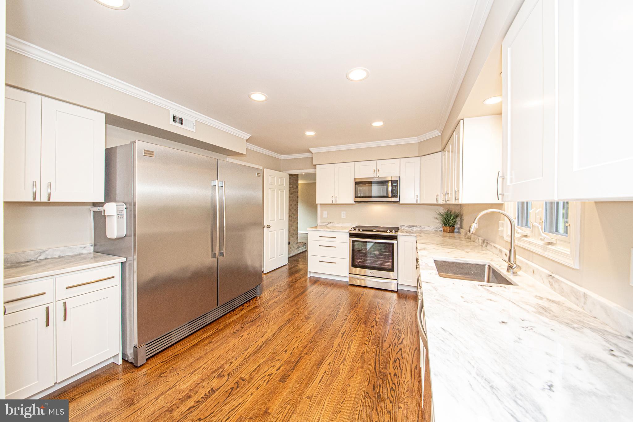 16825 Excaliber Way Sandy Spring, MD 20860 - Photo 8 of 37 Sparkling kitchen w/ SS Appliances & Gas Range