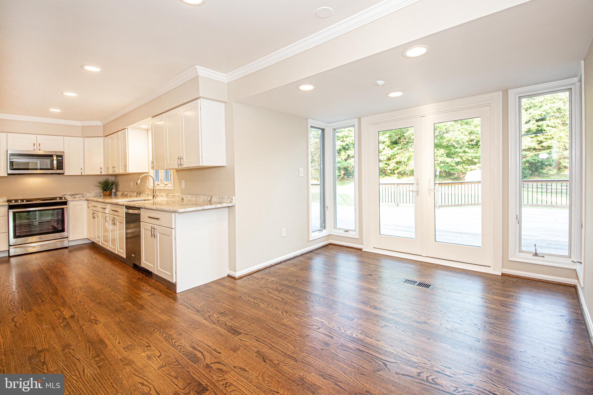 16825 Excaliber Way Sandy Spring, MD 20860 - Photo 10 of 37 Eat in Kitchen, Anderson French Doors lead to deck