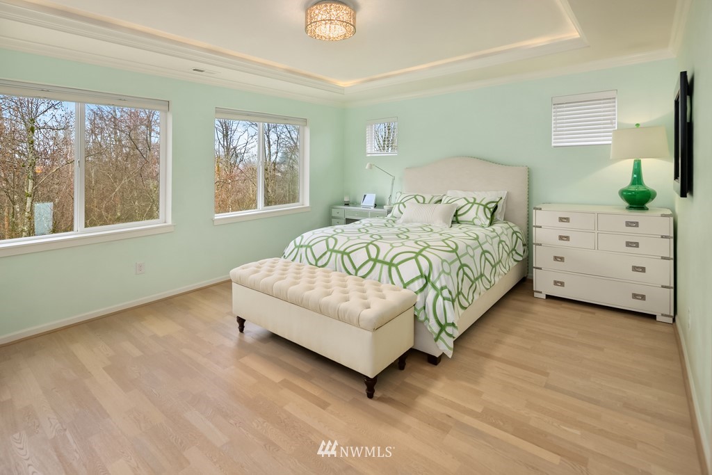 839 Lyons Avenue Northeast Renton, WA 98059 - Photo 27 of 39 a bedroom with a bed mirror and window