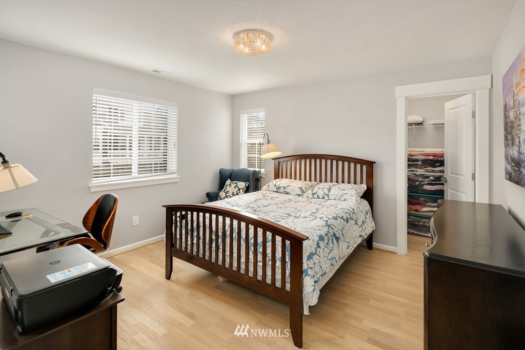 839 Lyons Avenue Northeast Renton, WA 98059 - Photo 32 of 39 a bedroom with furniture and a window