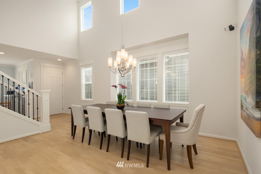839 Lyons Avenue Northeast Renton, WA 98059 - Photo 6 of 39 a view of a dining room with furniture and window