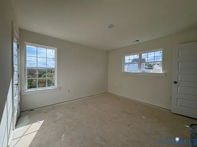 an empty room with windows