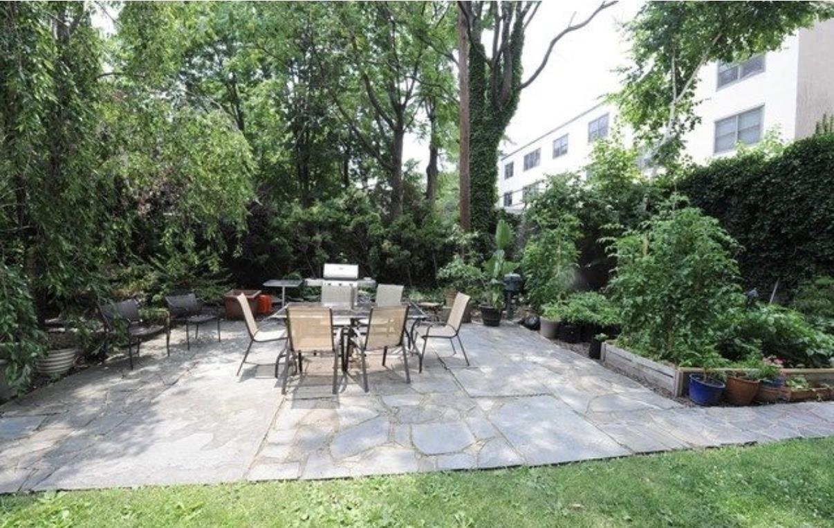 211 14th Street, Unit 2R Hoboken, NJ 07030 - Photo 8 of 10 a view of a backyard with sitting area