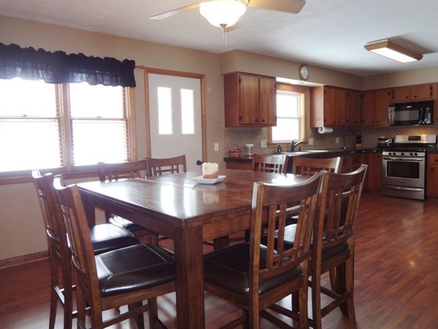 12920 Base Line Road Kingston, IL 60145 - Photo 3 of 25 a view of a dining room with furniture and window
