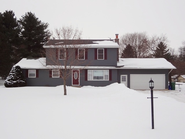 12920 Base Line Road Kingston, IL 60145 - Photo 25 of 25 a aerial view of a house with a yard