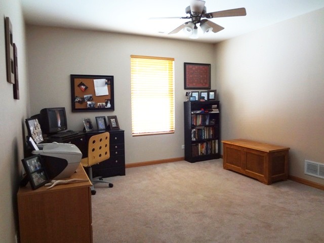 12920 Base Line Road Kingston, IL 60145 - Photo 8 of 25 a living room with furniture and a window