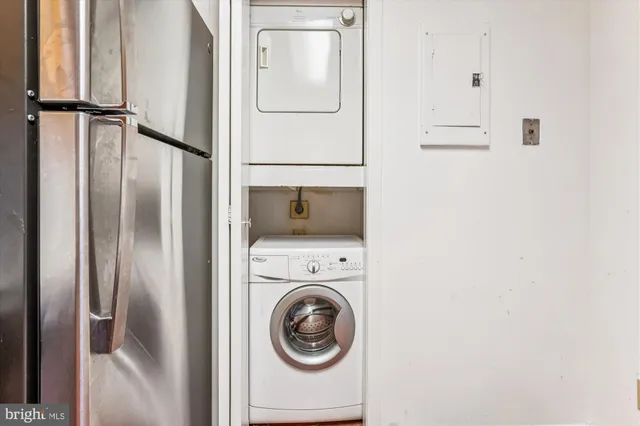 a utility room with dryer and washer