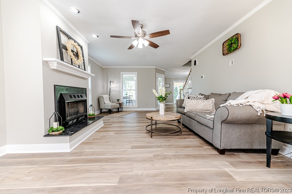 4286 Nicholson Road Cameron, NC 28326 - Photo 14 of 50 a living room with furniture and a fireplace