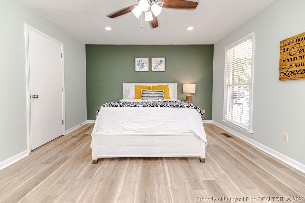 4286 Nicholson Road Cameron, NC 28326 - Photo 26 of 50 a large white bed in a white room next to a window