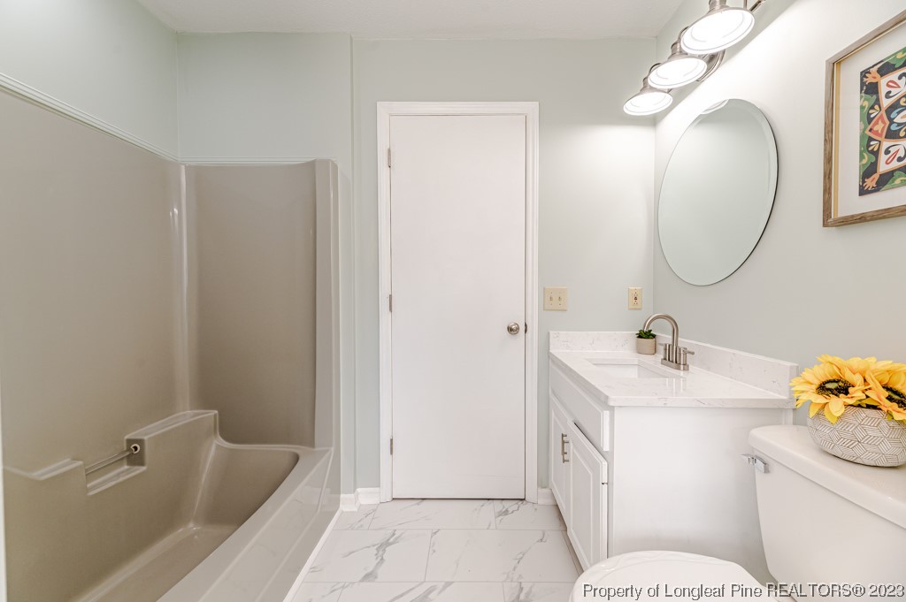 4286 Nicholson Road Cameron, NC 28326 - Photo 40 of 50 a bathroom with a sink toilet and shower