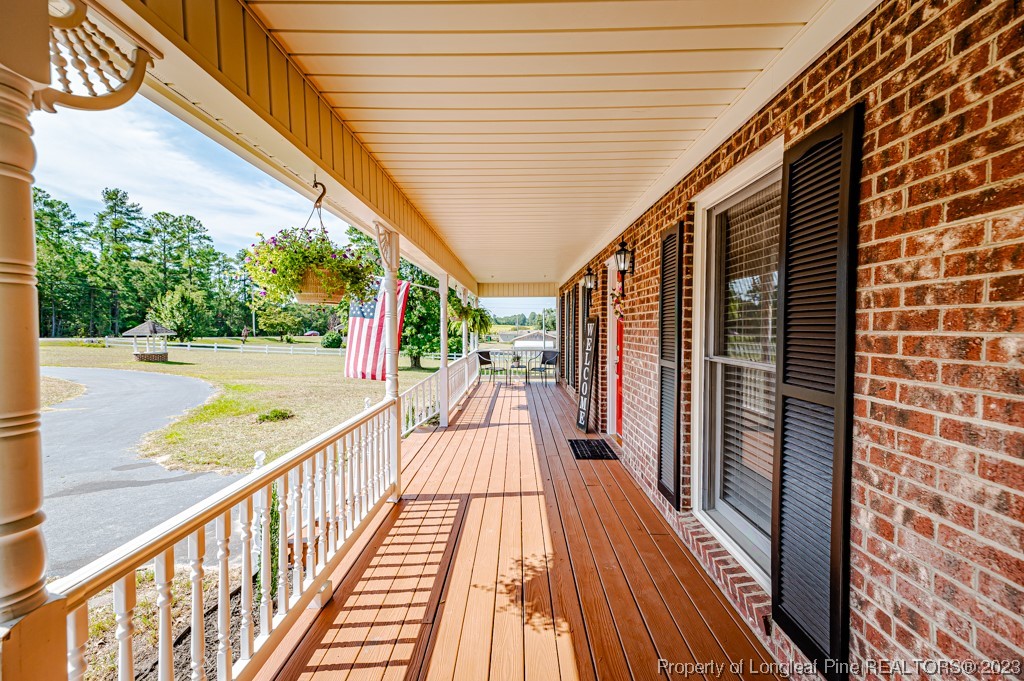 4286 Nicholson Road Cameron, NC 28326 - Photo 6 of 50 a view of balcony with wooden floor