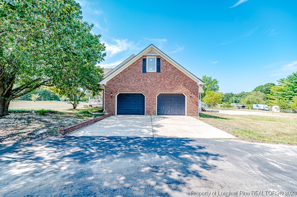 4286 Nicholson Road Cameron, NC 28326 - Photo 9 of 50 a front view of house with yard and green space