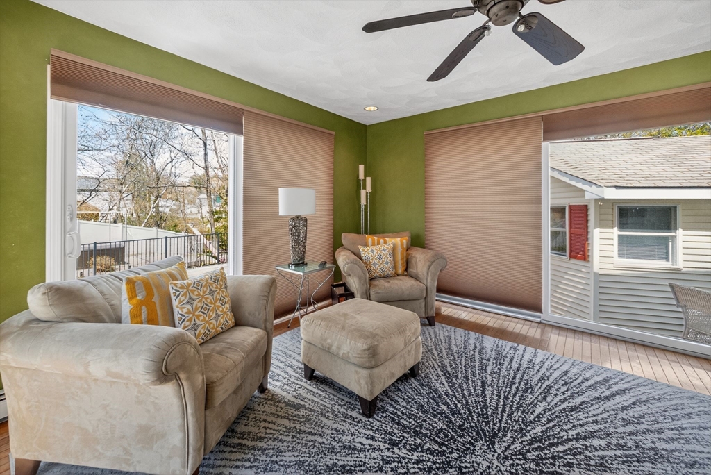 22 McRayne Hill Road Billerica, MA 01821 - Photo 11 of 42 a living room with furniture and a large window