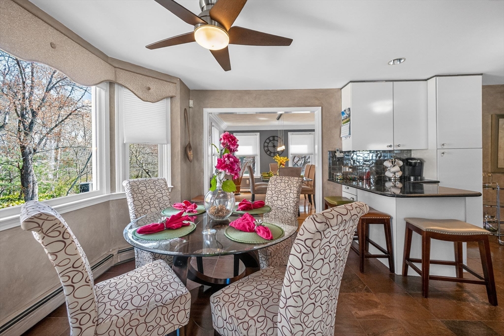 22 McRayne Hill Road Billerica, MA 01821 - Photo 15 of 42 a view of a dining room with furniture and window