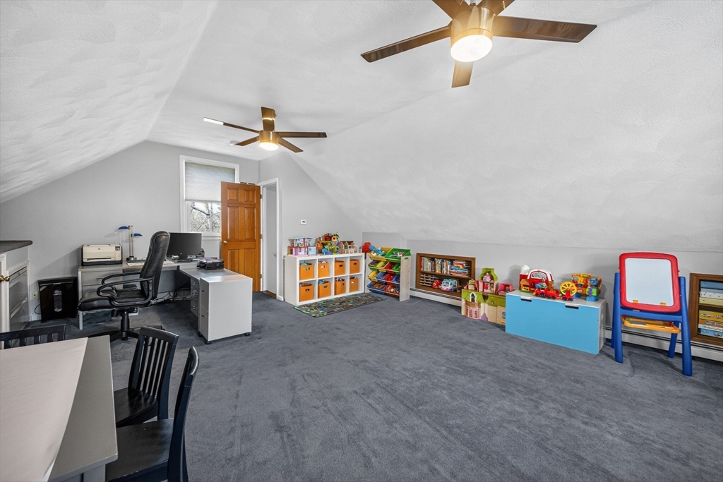22 McRayne Hill Road Billerica, MA 01821 - Photo 22 of 42 a view of livingroom with furniture and workspace
