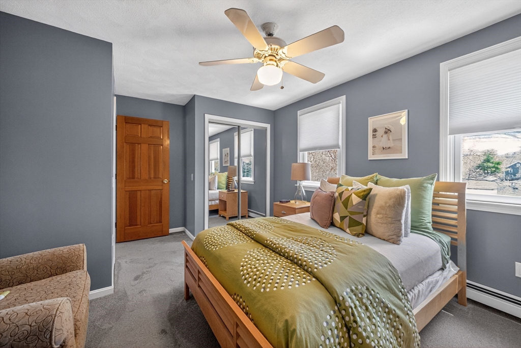 22 McRayne Hill Road Billerica, MA 01821 - Photo 23 of 42 a bedroom with a bed and a couch